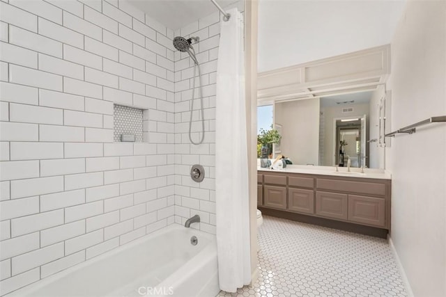 74 Tennis Club Dr, Rancho Mirage, CA 92270 - full bath featuring vanity, baseboards, tile patterned floors, and shower / bath combo