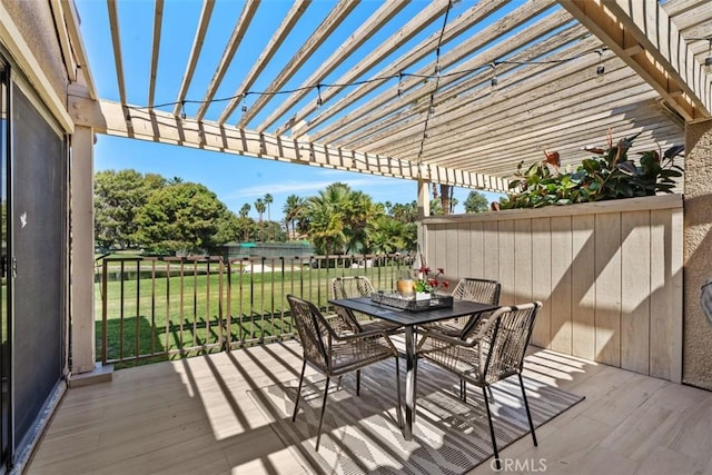 74 Tennis Club Dr, Rancho Mirage, CA 92270 - wooden deck with a lawn, a pergola, and outdoor dining space