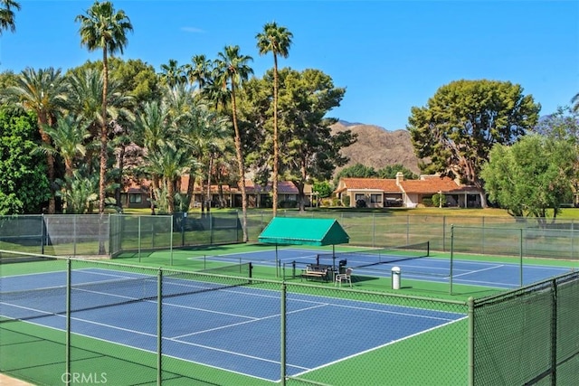 74 Tennis Club Dr, Rancho Mirage, CA 92270 - view of sport court with a mountain view, community basketball court, and fence