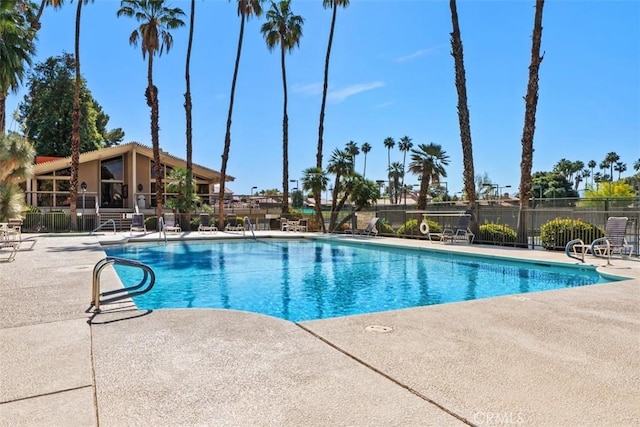 74 Tennis Club Dr, Rancho Mirage, CA 92270 - pool with a patio and fence