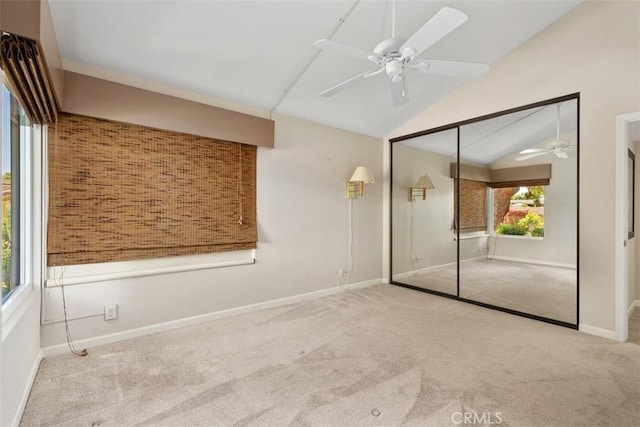 74 Tennis Club Dr, Rancho Mirage, CA 92270 - unfurnished bedroom with a closet, baseboards, ceiling fan, carpet flooring, and vaulted ceiling