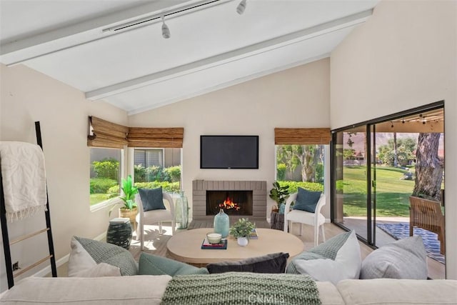 74 Tennis Club Dr, Rancho Mirage, CA 92270 - living room featuring a brick fireplace, baseboards, and vaulted ceiling with beams