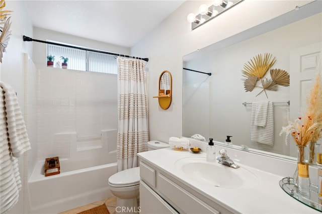 bathroom featuring vanity, toilet, tile patterned floors, and shower / tub combo with curtain