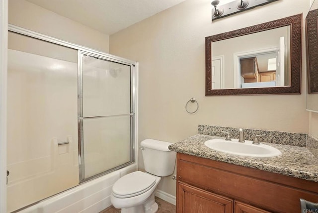 4230 48th St Unit 5, San Diego, CA 92115 - full bathroom with enclosed tub / shower combo, baseboards, toilet, and vanity