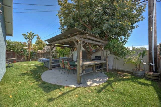 view of yard featuring a patio, a gazebo, and a fenced backyard