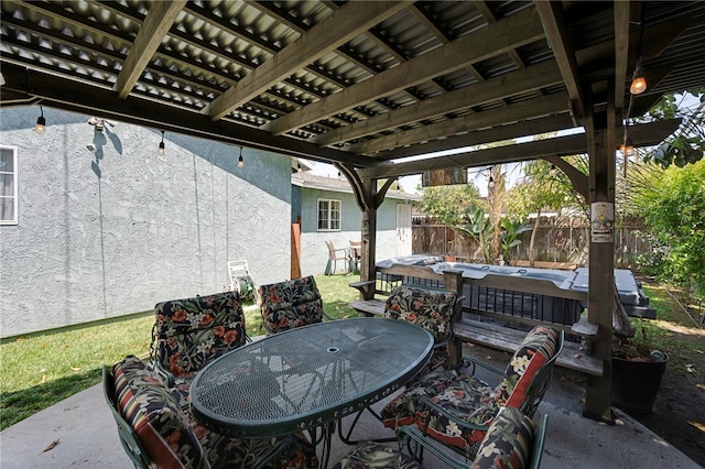 view of patio featuring outdoor dining space and a fenced backyard