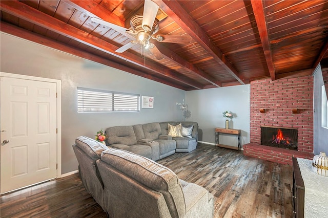living area with wooden ceiling, lofted ceiling with beams, ceiling fan, wood-type flooring, and a brick fireplace