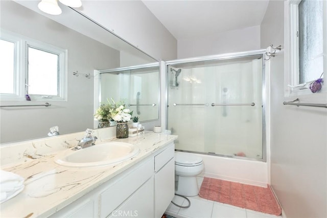 1337 Oakheath Dr, Harbor City, CA 90710 - bathroom featuring tile patterned floors, toilet, vanity, and shower / bath combination with glass door