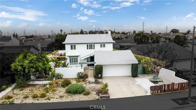 1337 Oakheath Dr, Harbor City, CA 90710 - traditional-style home featuring a residential view, driveway, a garage, and fence