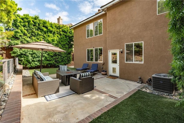view of patio / terrace featuring central air condition unit, fence, and an outdoor hangout area