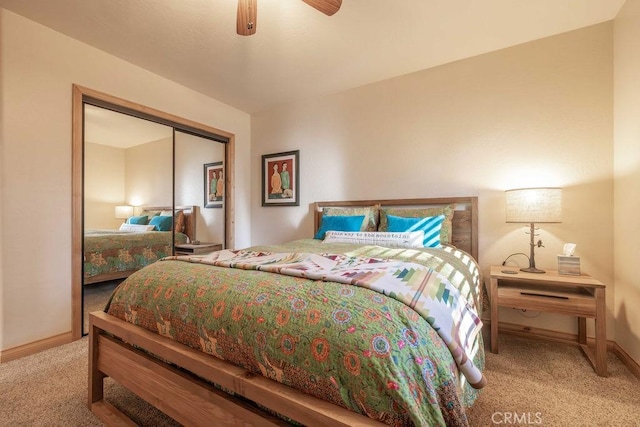 bedroom featuring a closet, carpet flooring, ceiling fan, and baseboards