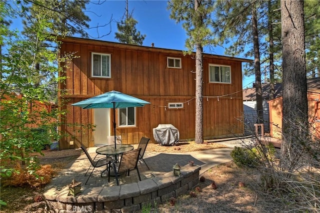 rear view of property with a patio