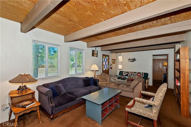 carpeted living room featuring beamed ceiling and wood ceiling