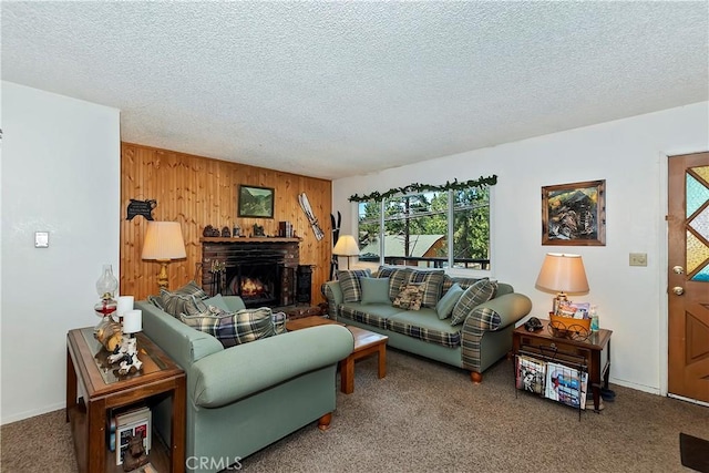 living area featuring wood walls, a textured ceiling, carpet, and plenty of natural light