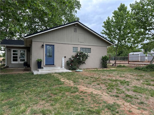 5222 Foster Rd, Paradise, CA 95969 - view of front of property with fence, stucco siding, and a front yard