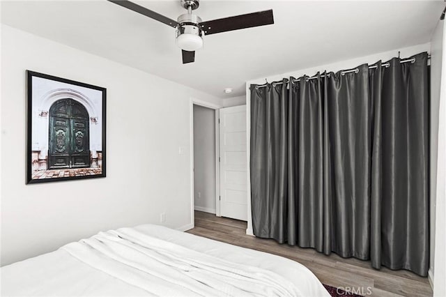 5222 Foster Rd, Paradise, CA 95969 - bedroom with baseboards, a ceiling fan, and wood finished floors