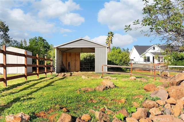 5222 Foster Rd, Paradise, CA 95969 - view of yard featuring an exterior structure, an outdoor structure, and a carport