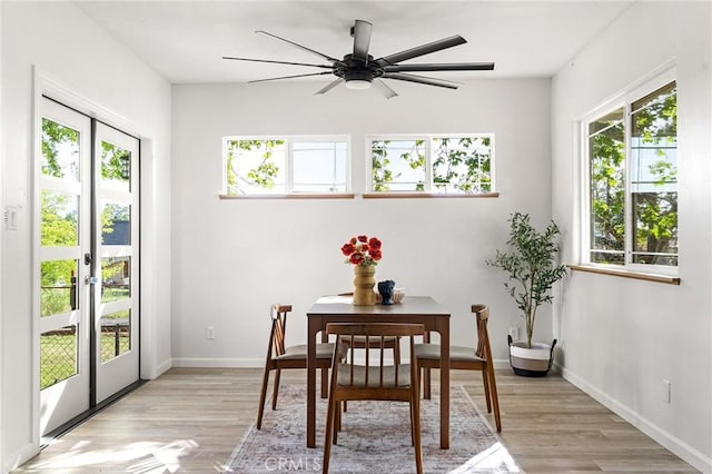5222 Foster Rd, Paradise, CA 95969 - dining space featuring light wood-type flooring, a ceiling fan, baseboards, and french doors