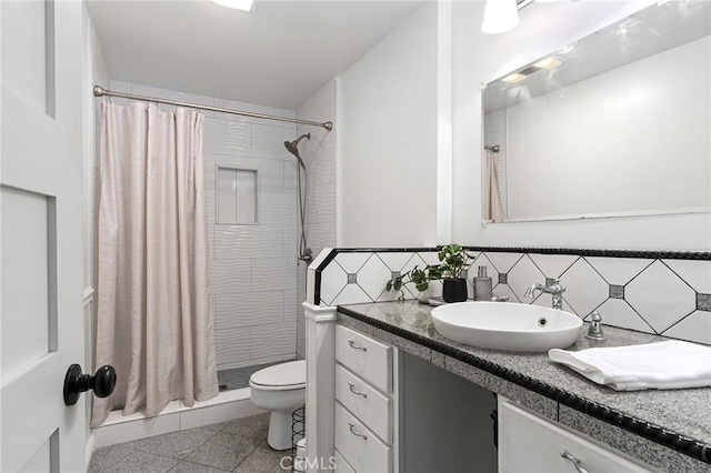 5222 Foster Rd, Paradise, CA 95969 - bathroom with vanity, backsplash, a stall shower, and toilet