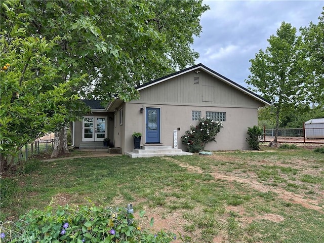 5222 Foster Rd, Paradise, CA 95969 - rear view of property with a yard, fence, and stucco siding