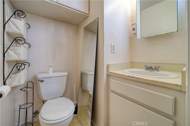 10710 El Camino Real Unit 26, Atascadero, CA 93422 - half bathroom with vanity, toilet, and baseboards