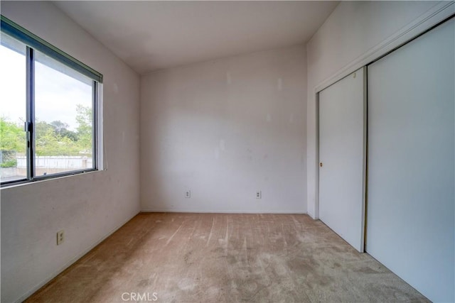 10710 El Camino Real Unit 26, Atascadero, CA 93422 - unfurnished bedroom with light colored carpet and a closet
