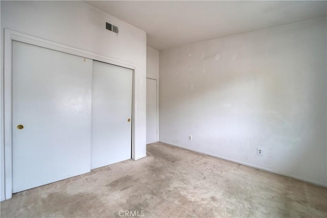 10710 El Camino Real Unit 26, Atascadero, CA 93422 - unfurnished bedroom with visible vents, carpet floors, and a closet
