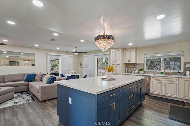 2161 Stonefield Pl, Riverside, CA 92506 - kitchen featuring open floor plan, decorative backsplash, a sink, and dishwasher