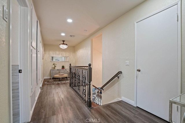 2161 Stonefield Pl, Riverside, CA 92506 - hallway featuring baseboards, an upstairs landing, wood finished floors, and visible vents