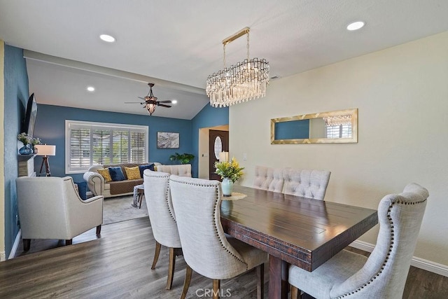 2161 Stonefield Pl, Riverside, CA 92506 - dining area with lofted ceiling, wood finished floors, baseboards, recessed lighting, and ceiling fan with notable chandelier