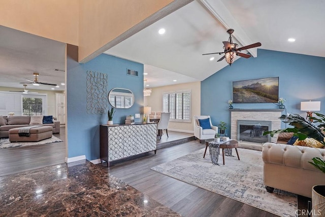 2161 Stonefield Pl, Riverside, CA 92506 - living room with a ceiling fan, a stone fireplace, visible vents, baseboards, and beamed ceiling