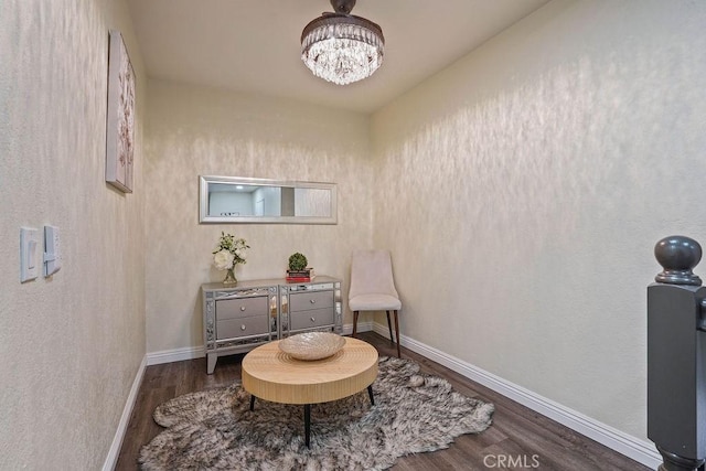 2161 Stonefield Pl, Riverside, CA 92506 - sitting room with an inviting chandelier, baseboards, and wood finished floors