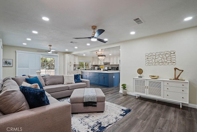 2161 Stonefield Pl, Riverside, CA 92506 - living area featuring dark wood-style flooring, ceiling fan, recessed lighting, and visible vents