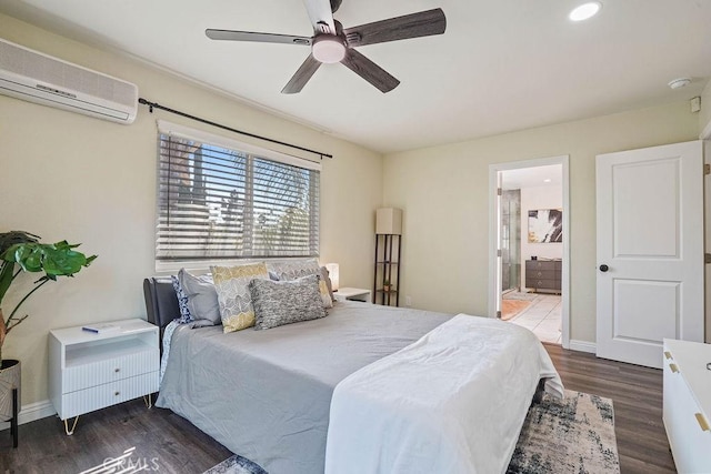 2161 Stonefield Pl, Riverside, CA 92506 - bedroom with wood finished floors, baseboards, a wall mounted air conditioner, ensuite bathroom, and ceiling fan