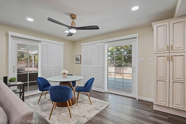 2161 Stonefield Pl, Riverside, CA 92506 - dining room featuring baseboards, ceiling fan, a healthy amount of sunlight, and dark wood-type flooring