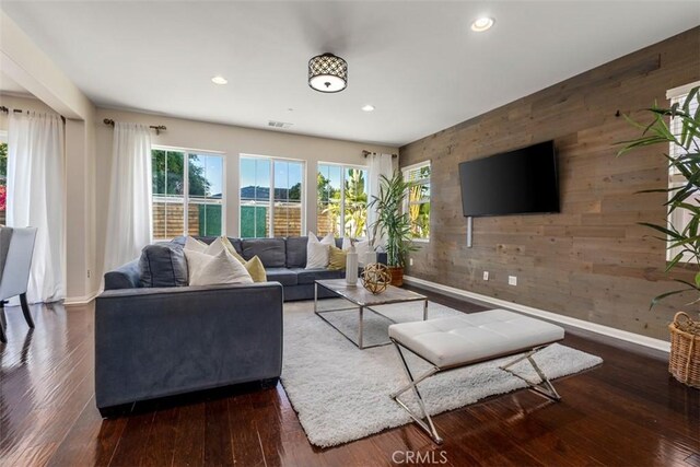 54 Revell Cir, Buena Park, CA 90620 - living area featuring baseboards, recessed lighting, wooden walls, and hardwood / wood-style flooring