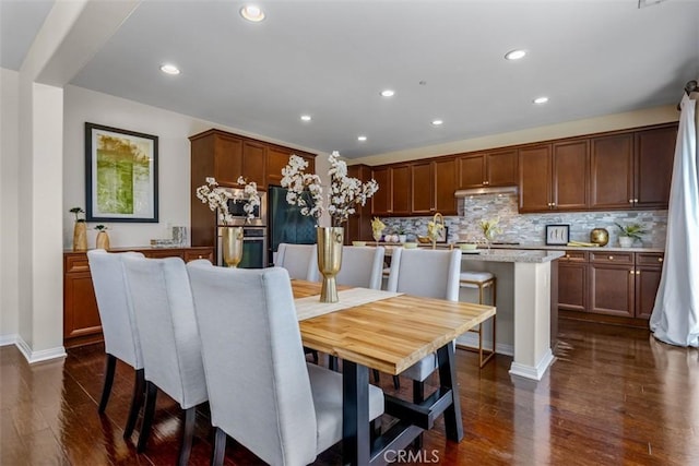 54 Revell Cir, Buena Park, CA 90620 - dining space featuring dark wood-style flooring, recessed lighting, and baseboards