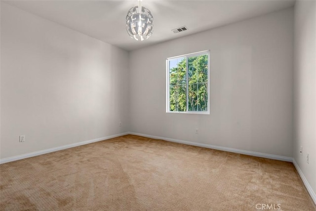 54 Revell Cir, Buena Park, CA 90620 - unfurnished room with carpet floors, baseboards, and a chandelier