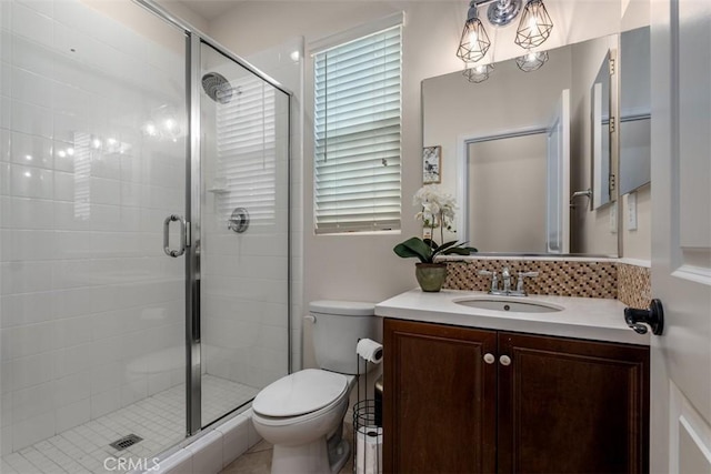 54 Revell Cir, Buena Park, CA 90620 - bathroom featuring toilet, a stall shower, decorative backsplash, and vanity