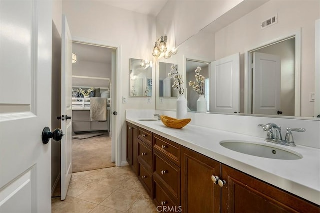 54 Revell Cir, Buena Park, CA 90620 - ensuite bathroom featuring double vanity and tile patterned flooring