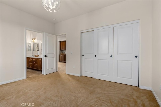 54 Revell Cir, Buena Park, CA 90620 - unfurnished bedroom featuring light colored carpet, a closet, and baseboards
