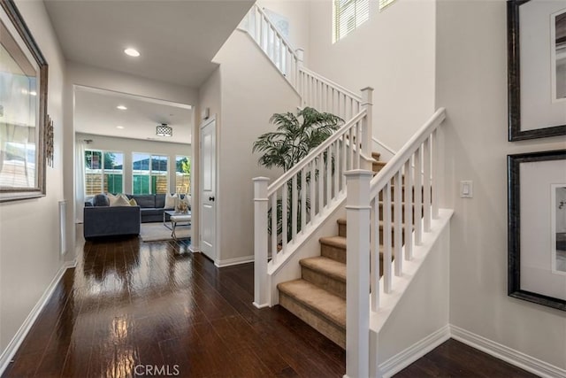54 Revell Cir, Buena Park, CA 90620 - stairs with hardwood / wood-style floors, baseboards, and recessed lighting