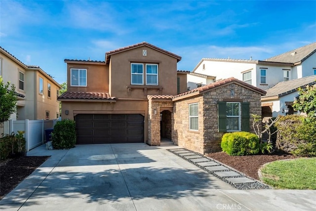 54 Revell Cir, Buena Park, CA 90620 - mediterranean / spanish house featuring a tiled roof, stucco siding, driveway, a garage, and stone siding