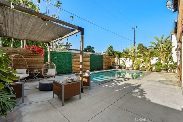 54 Revell Cir, Buena Park, CA 90620 - view of pool featuring a fenced backyard and a patio area