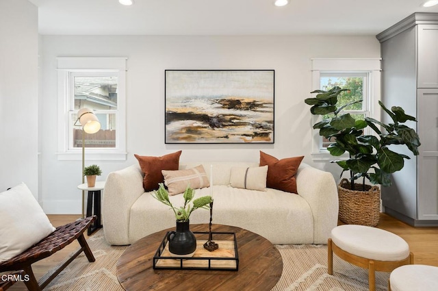 living room featuring recessed lighting and light wood finished floors