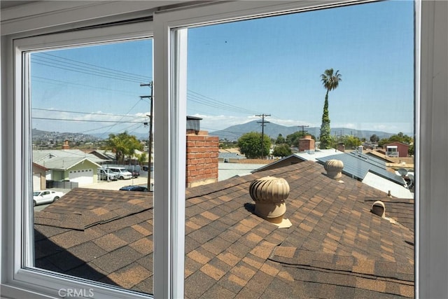 view of patio / terrace with a mountain view and a balcony