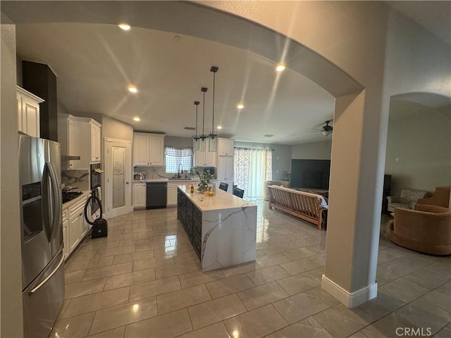 17366 Buckthorn Ave, Hesperia, CA 92345 - kitchen with ceiling fan, stainless steel fridge, a sink, black dishwasher, and open floor plan