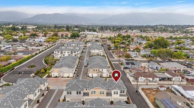 bird's eye view featuring a mountain view and a residential view