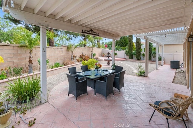 view of patio / terrace with a pergola, cooling unit, outdoor dining area, and a fenced backyard