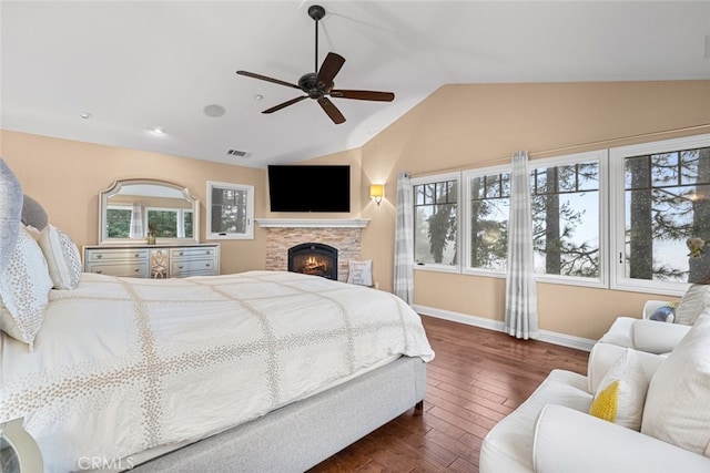 24848 Matterhorn Ct, Crestline, CA 92325 - bedroom featuring lofted ceiling, visible vents, baseboards, dark wood finished floors, and a fireplace
